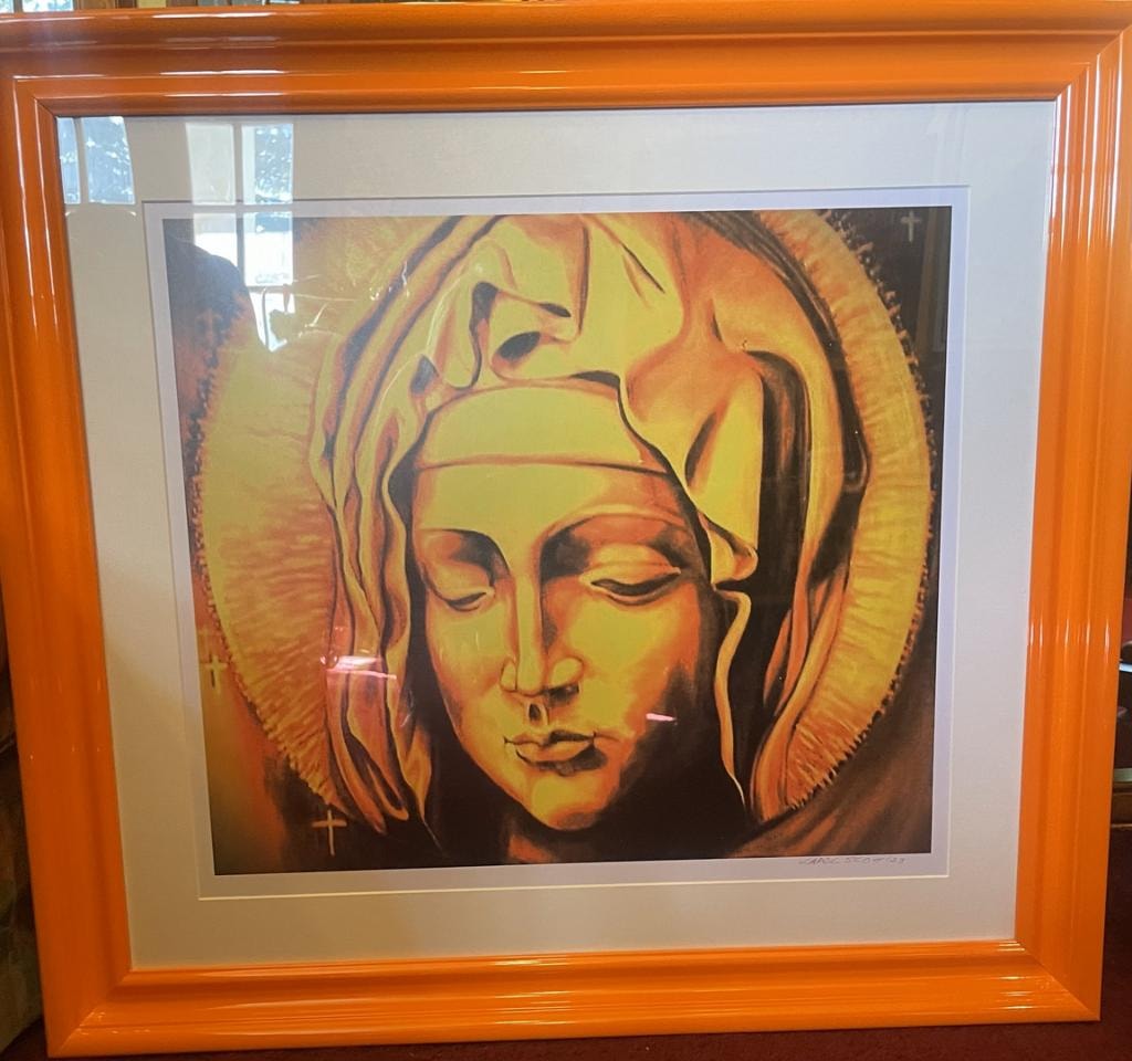 Framed golden Madonna portrait print in orange frame